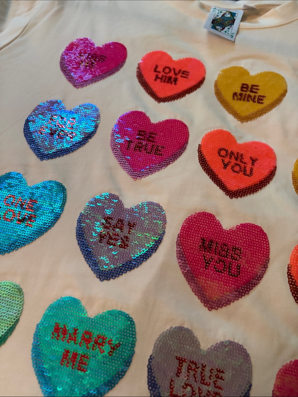 QUEEN OF SPARKLES Cream Short Sleeve Tee with Multicolored Sequin Hearts - Picture 3 of 7